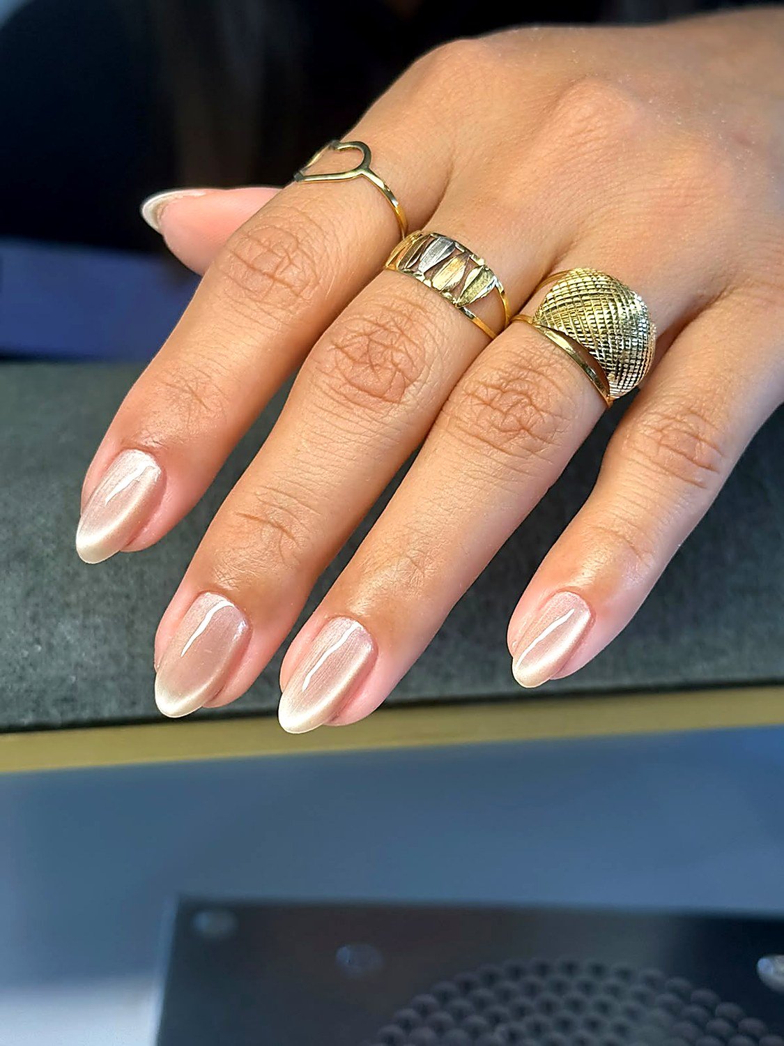 Pearl nude gel manicure with almond shape at She. beauty salon Porto